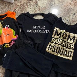 2 T-shirts’, tights and black dress